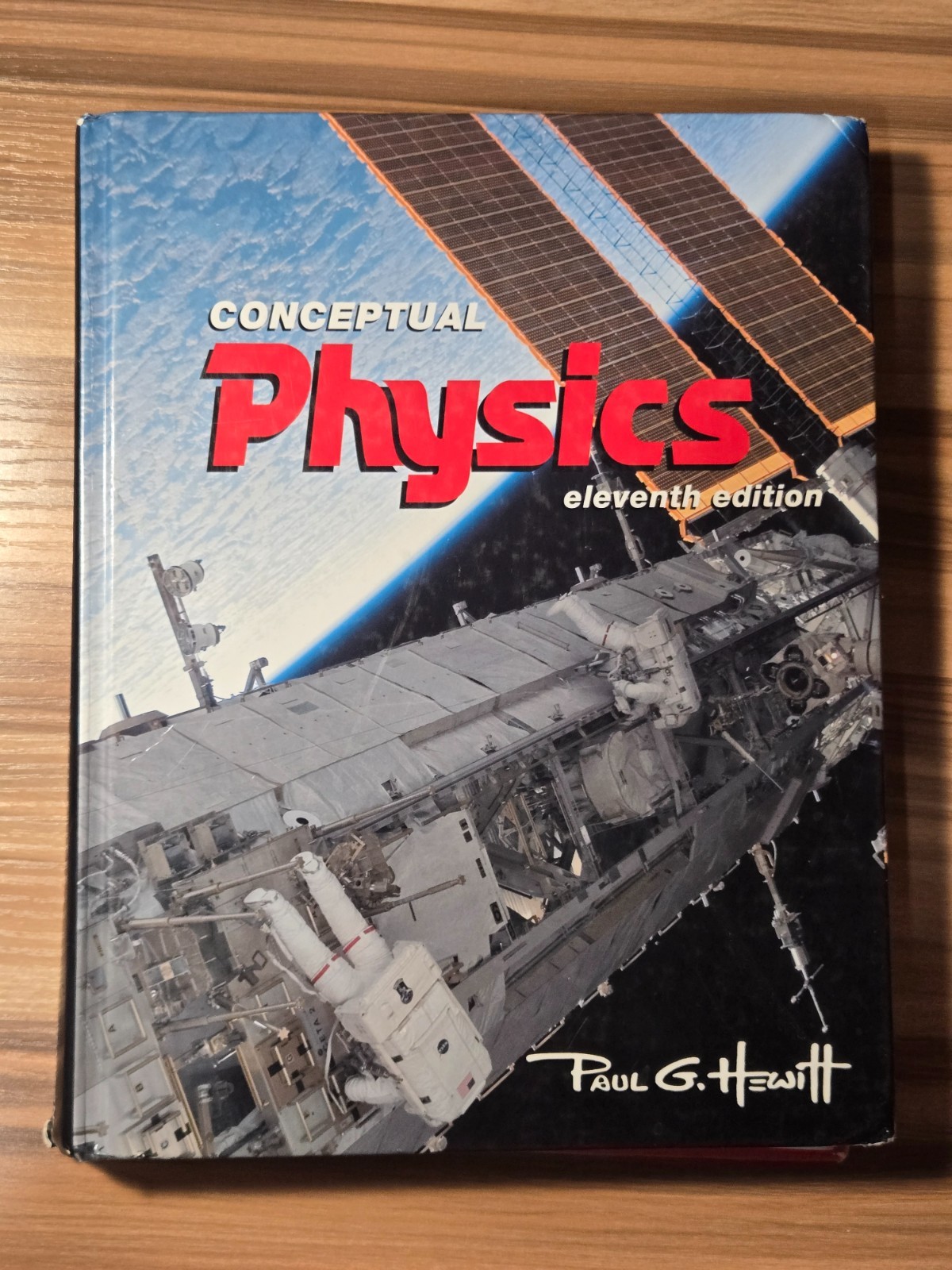 Conceptual Physics 11th edition Hard Cover by Paul G. Hewitt Addison